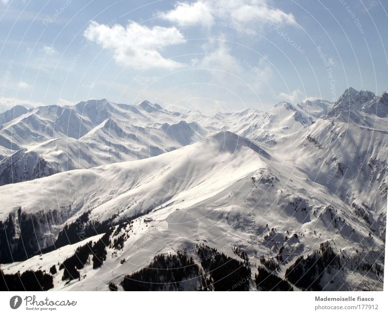 Snowy mountain tops Mountain Sky Sun Winter Alps Infinity Bright Tall Blue Black White Enthusiasm Freedom Colour photo Exterior shot Aerial photograph Deserted