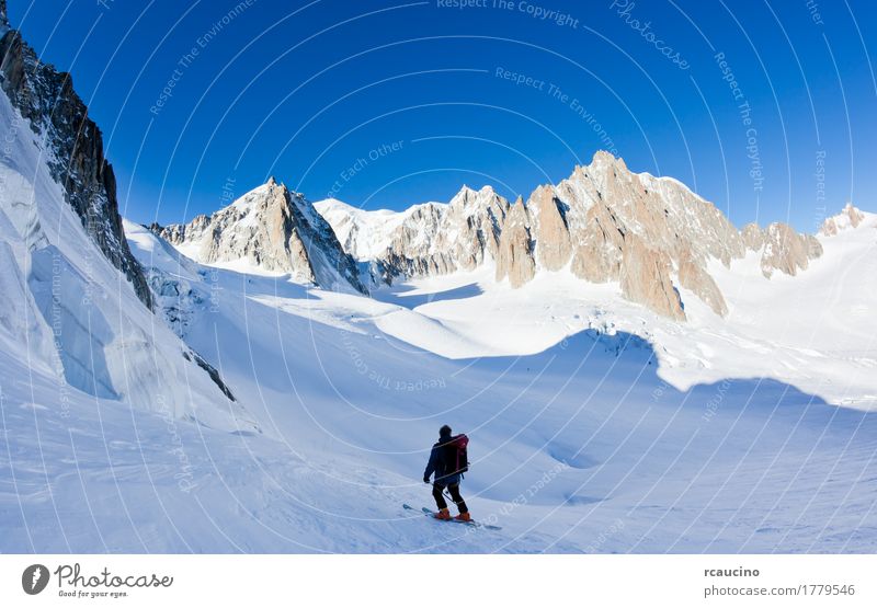 Skier in Mont Blanc Massif, Chamonix, France. Vacation & Travel Tourism Expedition Winter Snow Mountain Man Adults Nature Landscape Sky Alps Glacier White