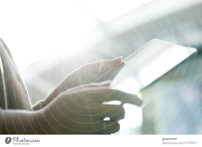 Close-up shot of female hands holding touch pad against bright sunlight Computer Young woman Youth (Young adults) Hand 1 Human being Bright Modern