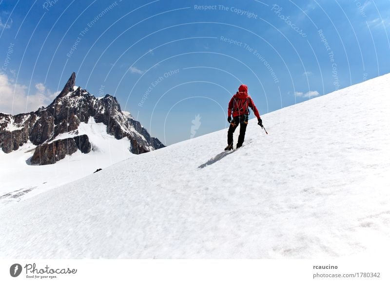 Climber on a glacier, Mont Blanc, Chamonix, France. Joy Adventure Expedition Winter Snow Mountain Sports Climbing Mountaineering Success Man Adults Nature