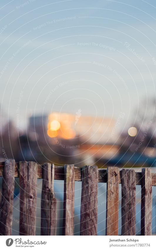 Allotments II Environment Garden Esthetic Fence Wooden board Sunlight Brown Blue Wooden fence Border Real estate Boundary line Blur Free space Garden plot