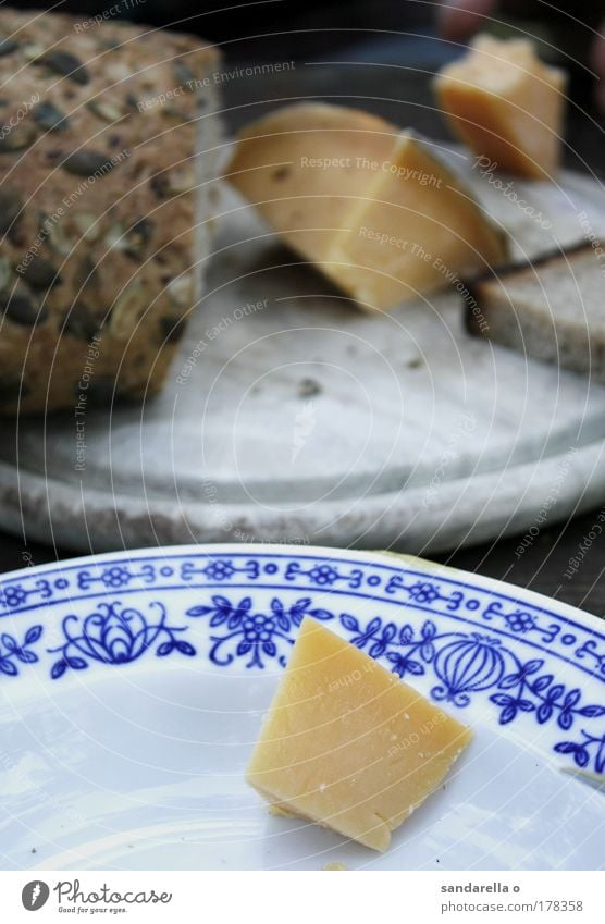 farmer's breakfast Subdued colour Exterior shot Deserted Evening Shallow depth of field Food Cheese Dairy Products Dough Baked goods Bread Nutrition Dinner