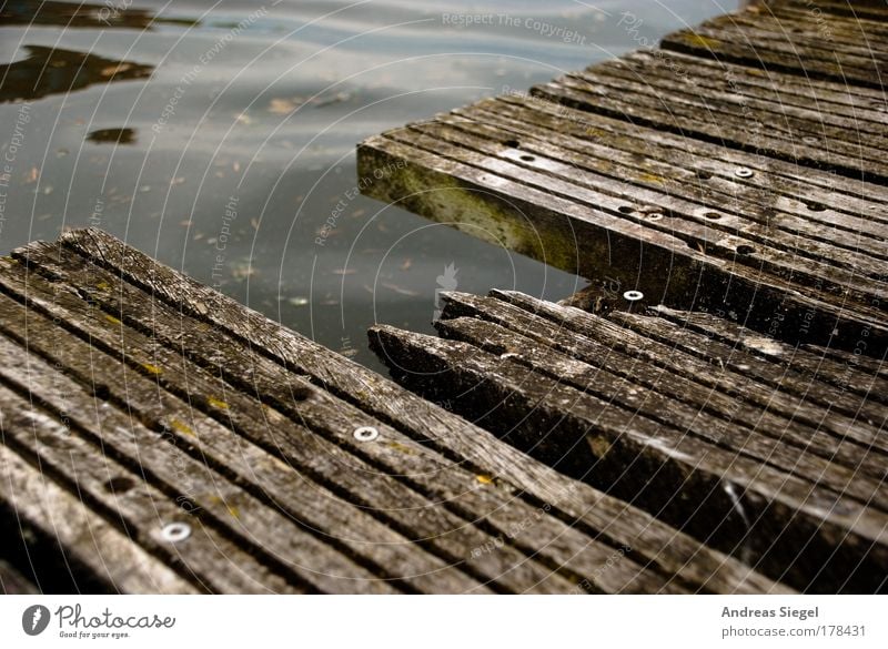 put holes in the way Colour photo Subdued colour Exterior shot Detail Deserted Day Water Lanes & trails Plank Wooden board Joist Harbour Footbridge Screw Line