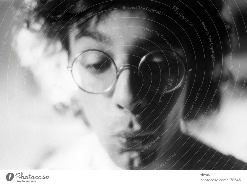 undergraduate degree Man Masculine Looking Black & white photo Eyeglasses Amazed Shadow Light Observe Marvel Mouth Lips Hair and hairstyles