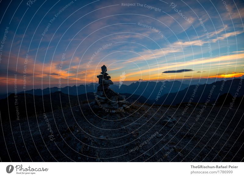 cairn Environment Nature Landscape Sky Blue Orange Black Stone Switzerland Mountain Morning Clouds Alps Mountain range Colour photo Exterior shot Deserted