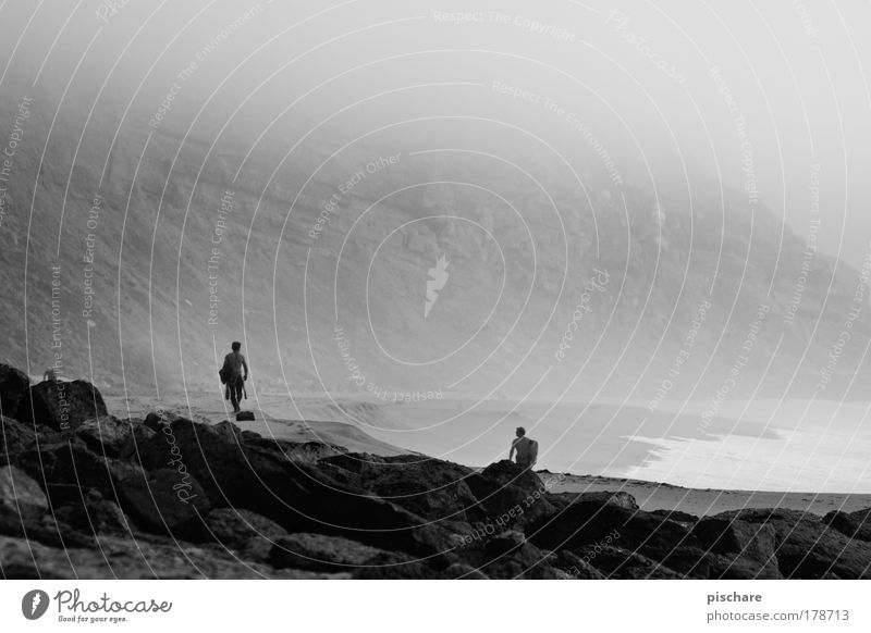 the search II Surfing Portugal pischarean Ocean Beach Surfer Atlantic Ocean Retro Far-off places Loneliness Fog Dark Mysterious Black & white photo Coast Cliff