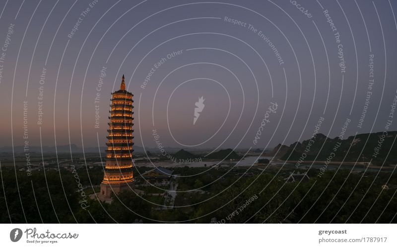 Dinh Pagoda complex in late evening with illuminated high tower temple. Sightseeing of Vietnam Vacation & Travel Tourism Culture Building Architecture Beautiful