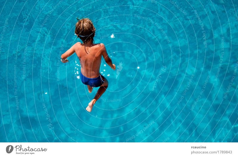 Boy jumping into sea water Joy Relaxation Vacation & Travel Tourism Summer Ocean Child Boy (child) Man Adults Jump Blue Turquoise White clear Crisp Horizontal