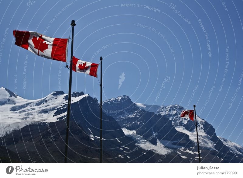 Canada Colour photo Exterior shot Nature Landscape Adventure Flag Mountain Snow Sky Blue