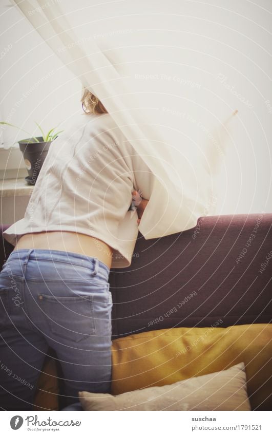 rear view of a child looking out the window Youth (Young adults) Young woman Child girl Living or residing Window Looking Rear view Back Hind quarters Jeans