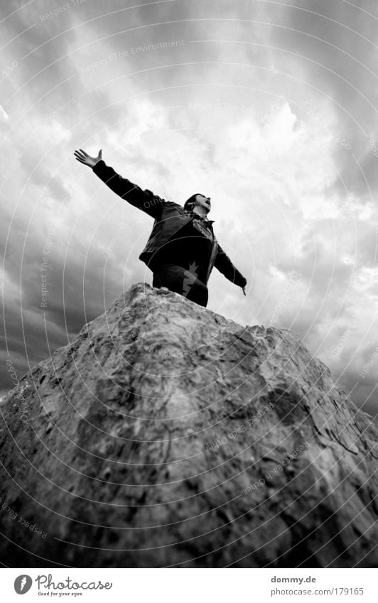 unattached Black & white photo Exterior shot Day Light Shadow Contrast Shallow depth of field Worm's-eye view Upper body Upward Looking away Joy Human being