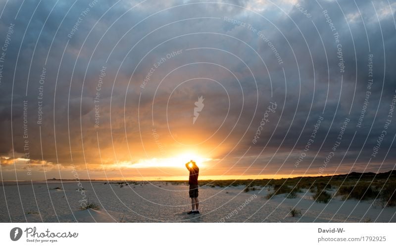 Man at sunset on the beach Human being Sunset Beach beautifully Illuminate Sunbeam tranquillity Nature Clouds Impressive Landscape Light Sky