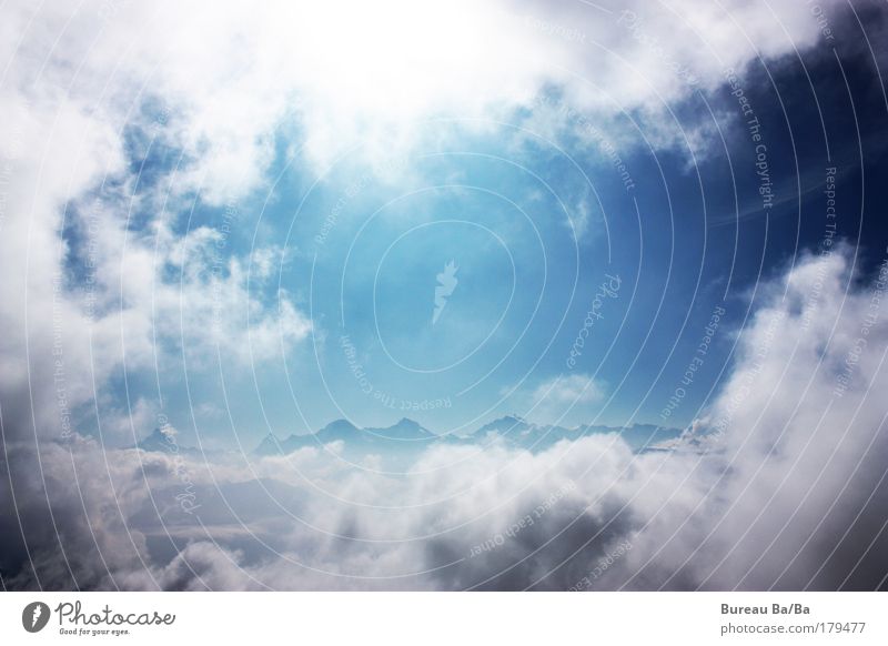 cloudy window Colour photo Exterior shot Clouds Mountain Blue Switzerland Bernese Oberland