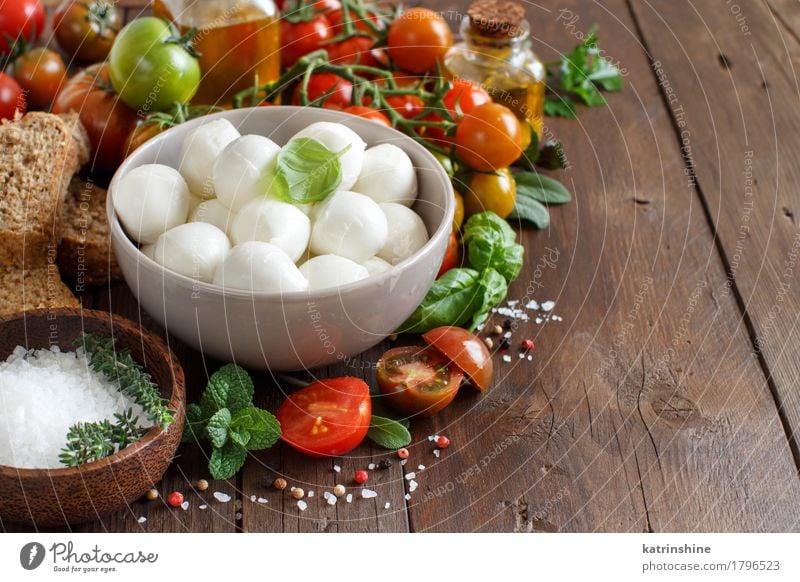 Italian food ingredients for caprese salad Cheese Vegetable Bread Herbs and spices Cooking oil Vegetarian diet Diet Italian Food Bowl Bottle Fresh Healthy