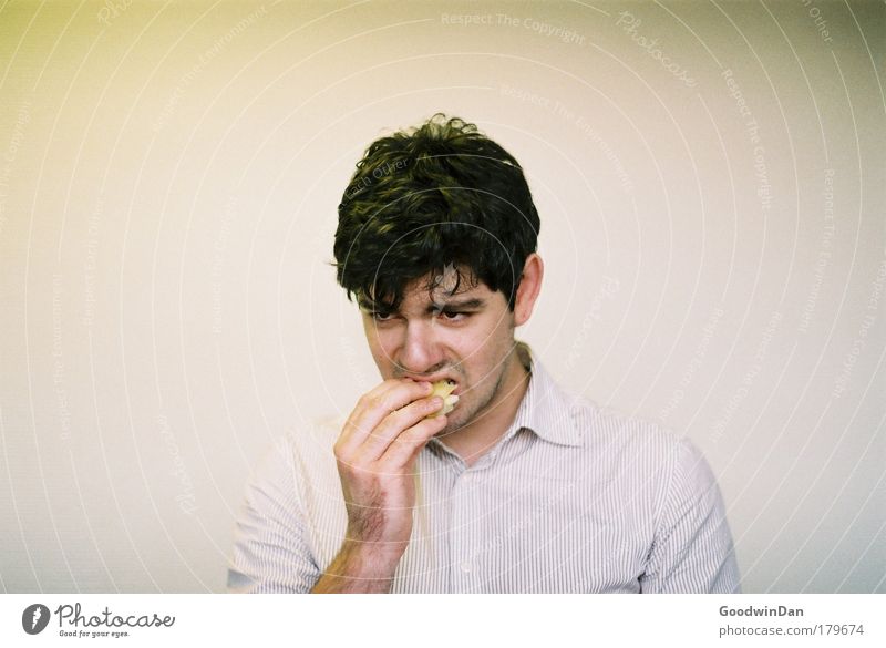 Everybody likes Maultaschen Eating Human being Masculine Young man Youth (Young adults) 1 Shirt Appetite Subdued colour Interior shot Neutral Background Day