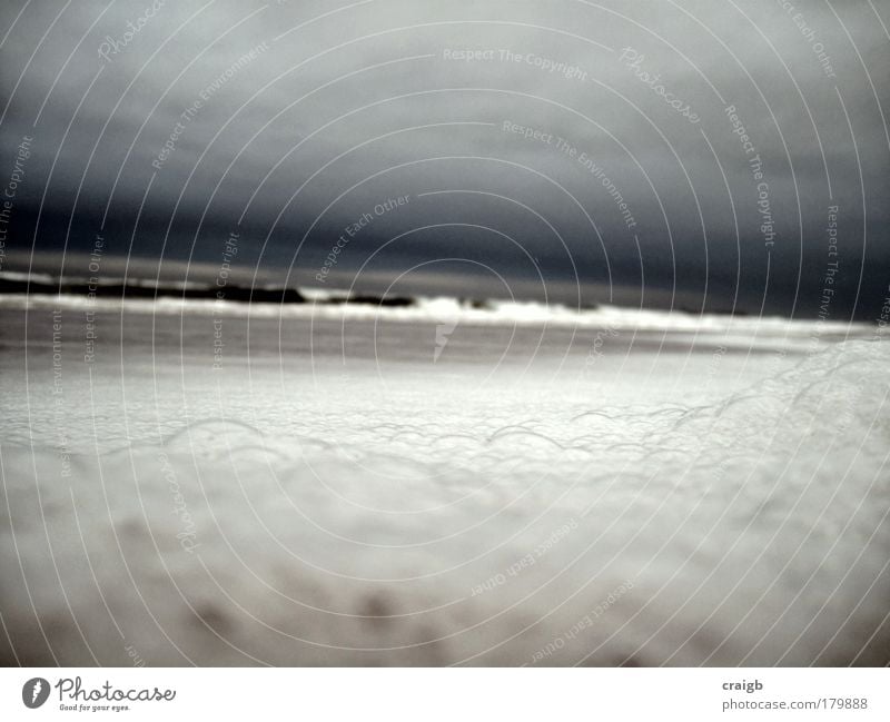 Meringue Colour photo Subdued colour Exterior shot Close-up Day Beach Ocean Waves Water Sky Weather Bad weather Storm Gale Coast Safety (feeling of) Horizon