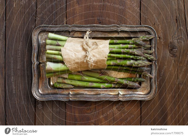 Bundle of fresh asparagus spears Vegetable Nutrition Dinner Vegetarian diet Diet Table Metal Dark Fresh Healthy Natural Brown Green Asparagus food Gourmet wood