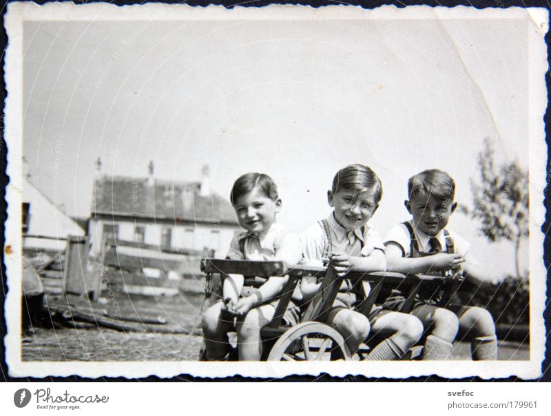 When the world was all right. Black & white photo Exterior shot Copy Space top Day Looking into the camera Playing Children's game Summer Human being Masculine