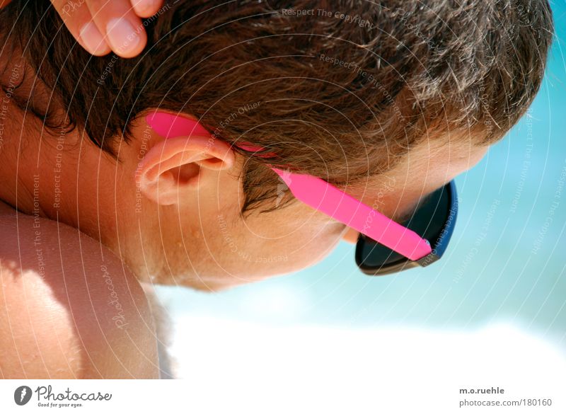 pink again Colour photo Exterior shot Copy Space right Shadow Shallow depth of field Rear view Half-profile Downward Looking away Human being Masculine