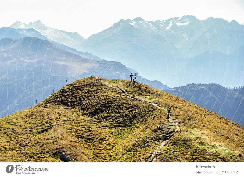 Mountain bikers at the finish on the summit mountains mountain biking mtb Mountain biking Sports Swiss Switzerland Grisons suisa Tourism Lifestyle landscape