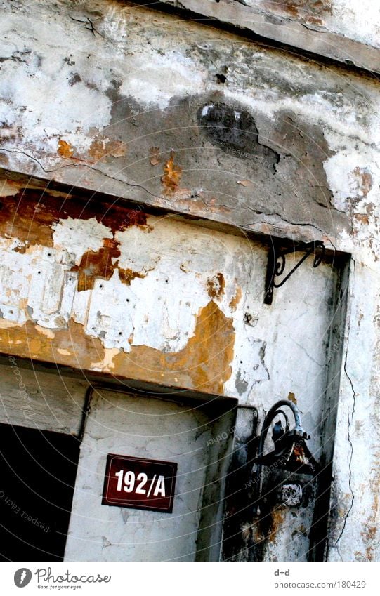 192/A Deserted House (Residential Structure) Wall (barrier) Wall (building) Facade Door Old Gloomy Brown Shabby Entrance House number Plaster Derelict Flake off