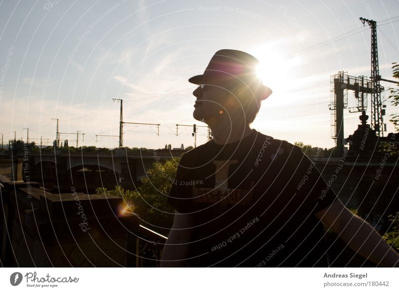 With hat Colour photo Subdued colour Exterior shot Day Evening Shadow Reflection Sunlight Sunbeam Back-light Portrait photograph Upper body Forward Lifestyle