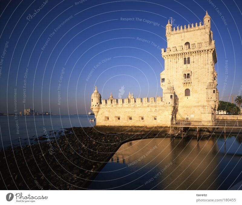 Tower in the mirror Water Cloudless sky River Tejo Lisbon Portugal Capital city Port City Deserted Manmade structures Lighthouse Facade Tourist Attraction