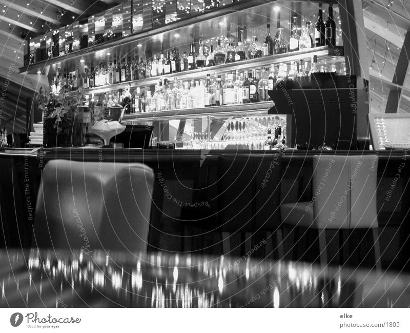 in cash Bar Mirror Table Nutrition Bottle Glass Chair Black & white photo