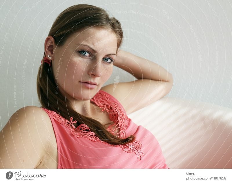 Woman in an armchair Armchair Room Feminine 1 Human being Shirt Jewellery Brunette Long-haired Braids Observe Think Looking Sit Wait pretty Self-confident