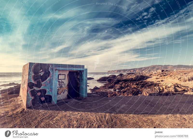 My house, my beach Landscape Sky Clouds Beautiful weather Coast Ocean Portugal Deserted Hut Wall (barrier) Wall (building) Old Hideous Blue Brown Graffiti