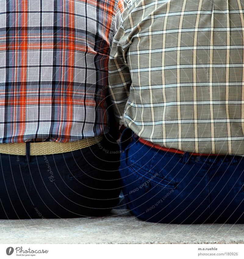 chequered Colour photo Exterior shot Detail Pattern Structures and shapes Copy Space bottom Day Contrast Upper body Rear view Looking away Human being Masculine