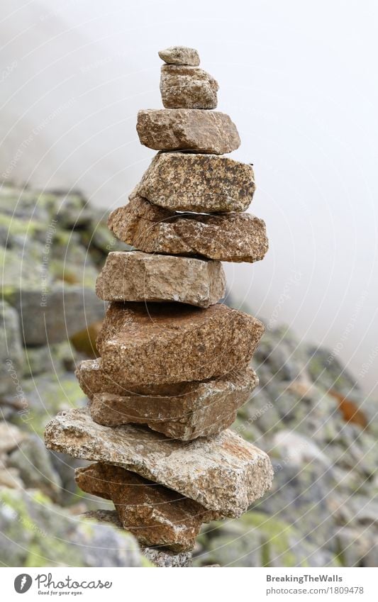 Pyramid of rocks and stones in mountains over fog Lifestyle Vacation & Travel Tourism Trip Adventure Far-off places Sightseeing Expedition Mountain Hiking