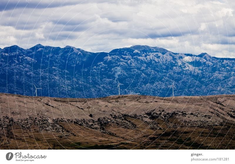 Waiting for Bora Energy industry Renewable energy Wind energy plant Environment Landscape Clouds Climate Rock Mountain pag Croatia Europe Rotate Blue Brown