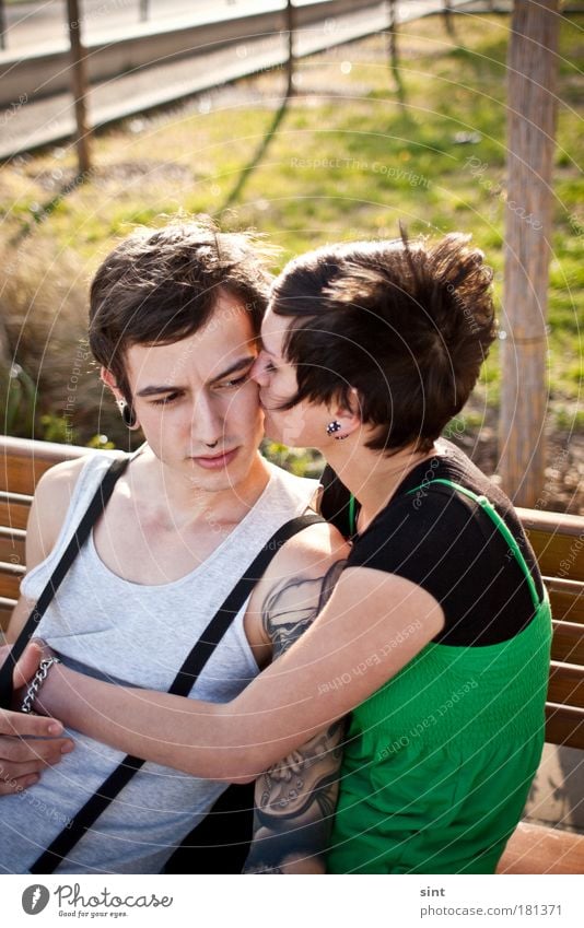 ick love you II Colour photo Exterior shot Sunlight Back-light Shallow depth of field Upper body Looking away Style Masculine Feminine Young woman