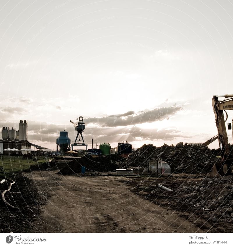 Site sunset impression Deserted Frankfurt Construction site Excavator Gloomy Harbour Gravel path Silhouette Horizon Sunset Industrial district Silo