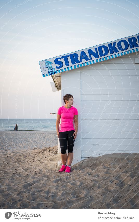 Woman on beach in sports outfit Beach Walking Running Running sports Break Beach chair Lake Exterior shot Beach sports relax inquisitorial Task workout