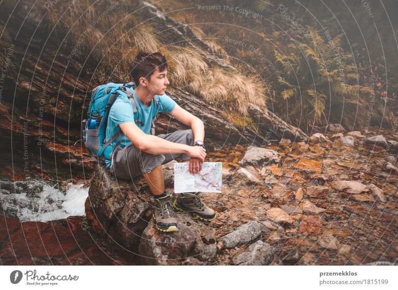 Boy sitting on a rock on mountain trail Lifestyle Leisure and hobbies Vacation & Travel Trip Adventure Freedom Summer Summer vacation Mountain Hiking