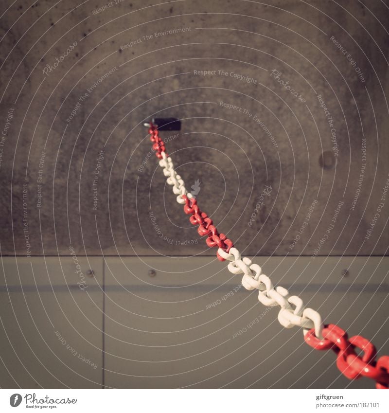 against the wall Colour photo Exterior shot Deserted Copy Space top Concrete Gray Red White Threat Safety Chain Wall (building) Wall (barrier) cordon Barrier