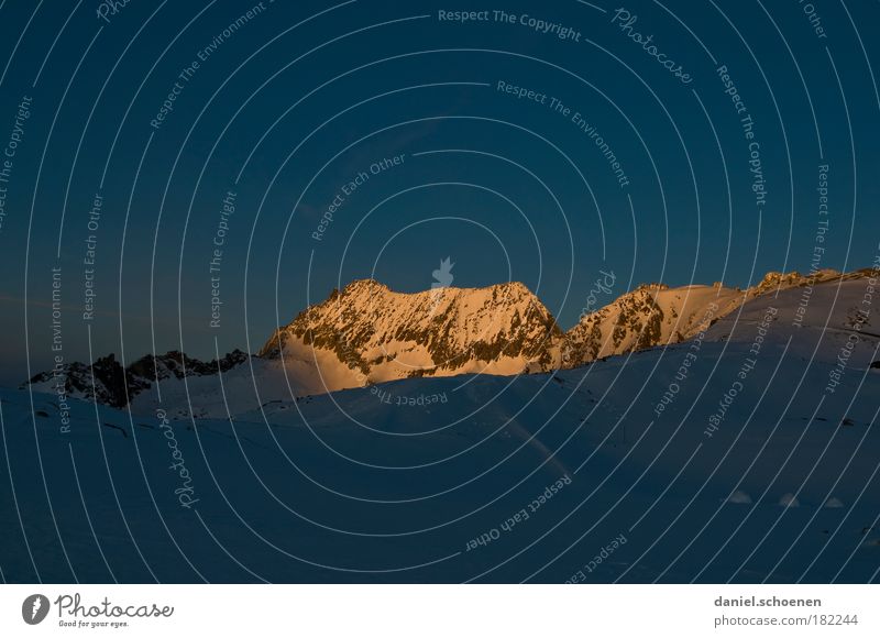 Sunrise, -15 degrees Copy Space top Copy Space bottom Sunset Cloudless sky Winter Alps Mountain Peak Snowcapped peak Cold Blue Nature Switzerland