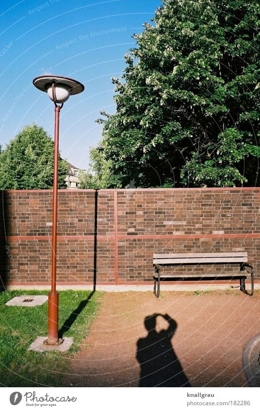 Shadowself with bench Self portrait Lantern Wall (barrier) Relaxation Break Take a photo Park 'Zollverein' mine Calm Silhouette Seating Bench Park bench