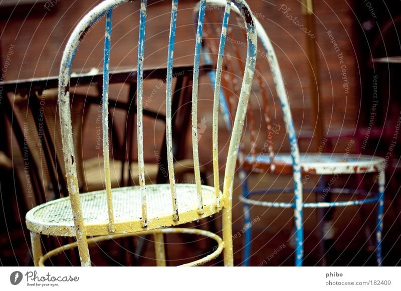 4 Sidewalk café Table Simple Retro Gloomy Blue Brown Yellow Calm Old Backrest Colour photo Multicoloured Exterior shot Deserted Day Shallow depth of field