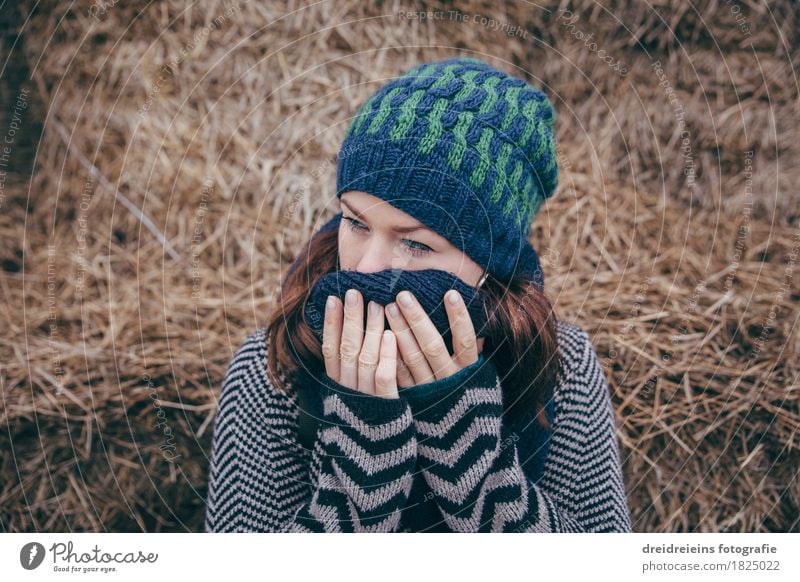 Melancholy. Feminine Young woman Youth (Young adults) Woman Adults 1 Human being Jacket Scarf Cap Think Sadness Cry Soft Emotions Hope Humble Concern Grief