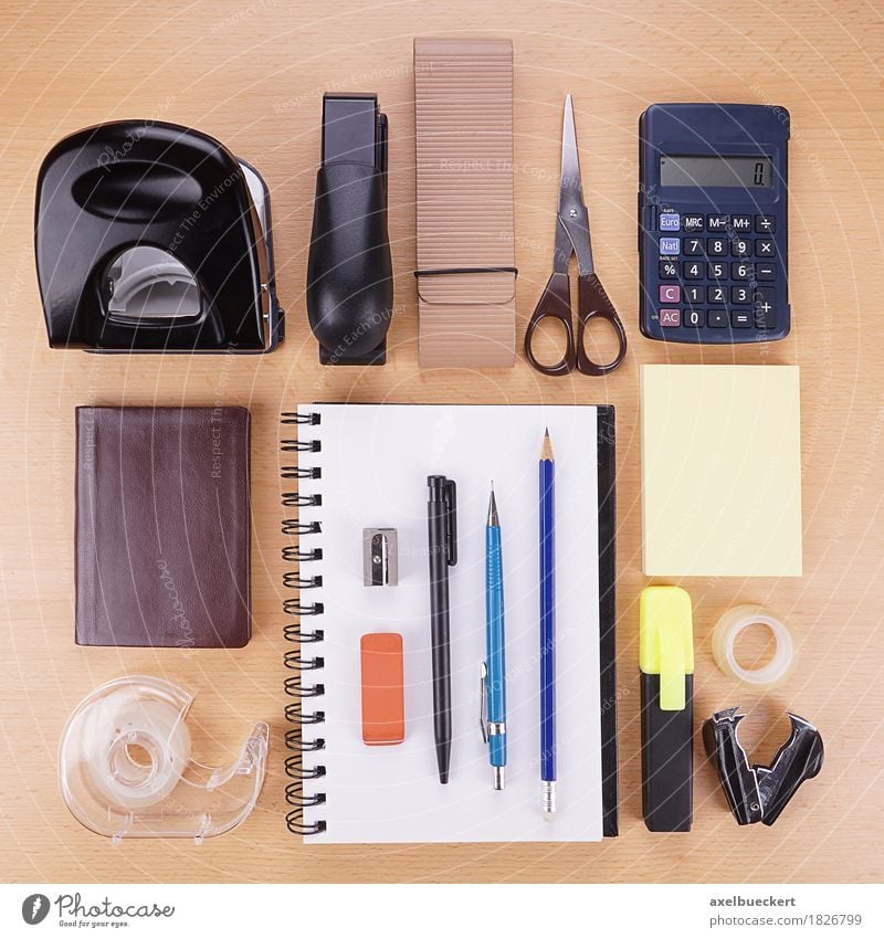 Stationery flat lay Leisure and hobbies Desk Table Office work Workplace Business Arrangement Hole puncher Stapler Scissors Pocket calculator Calendar Notebook