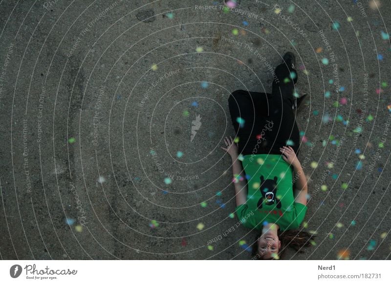 ground position Green Confetti Woman Laughter Ground T-shirt Above Bird's-eye view Lie Contentment Copy Space left Neutral Background Happiness Positive