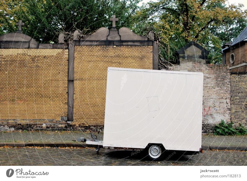 Cemetery behind trailer Kreuzberg Street Trailer Metal Stand Sharp-edged Cold White Sadness Grief Expressionless Parking space Rear side Christian cross