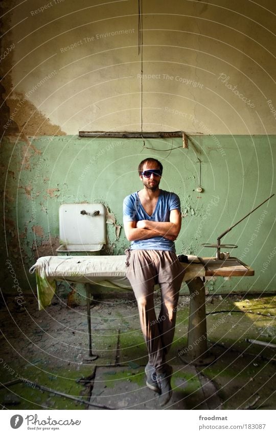 waiting room Colour photo Subdued colour Interior shot Copy Space top Day Sunlight Full-length Looking into the camera Human being Masculine Young man