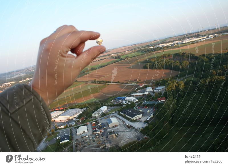 ...he's sooooo small!!! Exterior shot Aerial photograph Morning Bird's-eye view Forward Arm Hand Landscape Earth Sky Field Industrial plant Hot Air Balloon