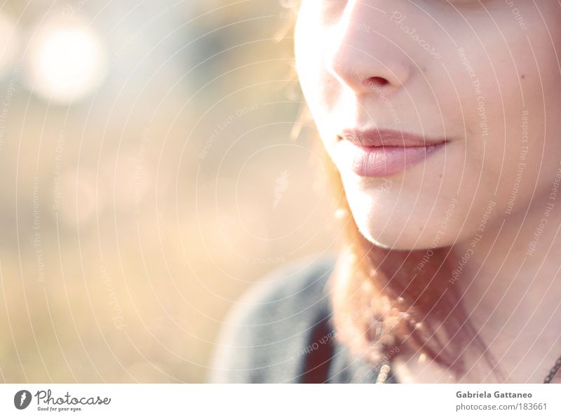 lip stories Colour photo Exterior shot Copy Space left Light Shadow Blur Feminine Hair and hairstyles Nose Mouth Lips Brunette Breathe To enjoy Smiling Free