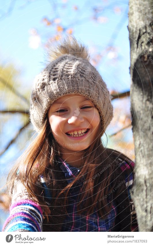 Beautiful smiling girl on the autumn tree Garden Human being Girl Face Eyes 1 8 - 13 years Child Infancy Nature Sky Sun Sunlight Autumn Beautiful weather Tree