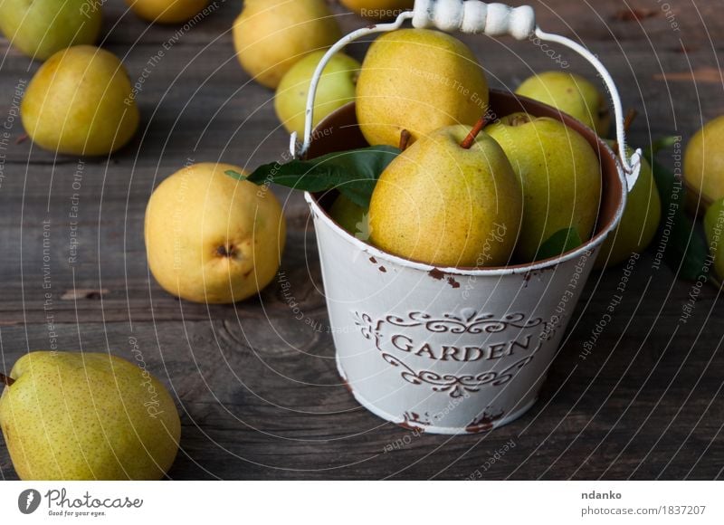 Ripe yellow pears are scattered on the table Food Fruit Dessert Nutrition Vegetarian diet Diet Summer Table Nature Autumn Wood Old Fresh Delicious Natural Retro